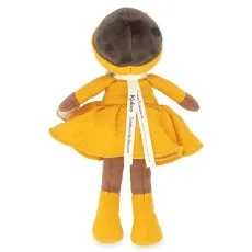 Rear view of the Kaloo fabric doll in a yellow dress, showing the bow headband and printed neck ribbon.