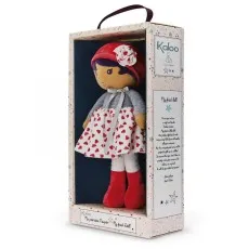 Kaloo My First Doll in a red beret and heart-print dress, packaged in a star-patterned box.