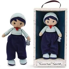 Kaloo fabric boy doll in a striped sailor outfit, shown unboxed and sealed in its starry display box.