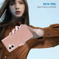 Close-up of a man holding the rose leather phone case with the camera cutout.