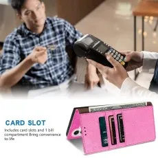 pink Wallet phone case with card slots. Man paying in background with credit card.