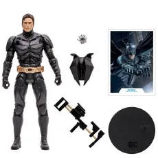 Batman action figure with unmasked head, tactical gear, weapon, and display stand.