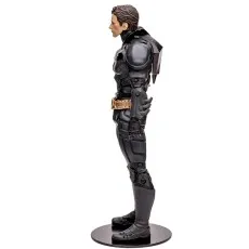 Left side profile of a Batman action figure in black armor standing on a display base