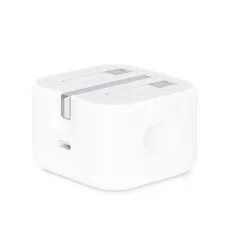 Compact white Apple USB-C power adapter with pins folded for easy storage and travel